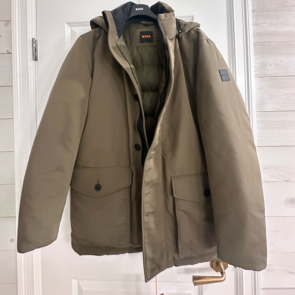 Men’s Hugo Boss Winter jacket new with tags.  Size XL, smoke free home